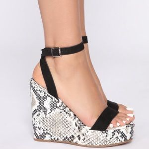 Snakeskin pattern wedge heels
